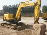 2023 Hyundai 60-7 mini excavator, side profile view