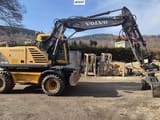 2005 Volvo EW140B wheel excavator side view