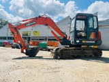 2004 Doosan DH55 mini excavator, side view