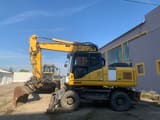 2012 Komatsu PW180-E0 wheel excavator side view
