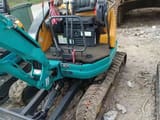 Kubota U-20 mini excavator, rear view of open operator station