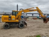 2007 Komatsu PW140-7 wheel excavator, side view