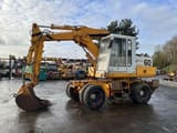1982 Poclain P60 wheel excavator, side view