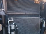Volvo EC210BNL crawler excavator radiator and cooling system detail