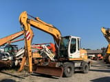 2002 Liebherr A312 wheel excavator, front three-quarter view