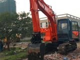2018 Hitachi EX120-3 crawler excavator, front three-quarter view