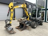 2023 Wacker Neuson EW65 wheel excavator, side view