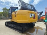Caterpillar 320GX crawler excavator, rear three-quarter view