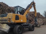 2015 Liebherr LH35 M material handler, rear three-quarter view
