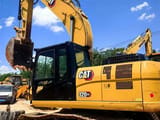 2023 Caterpillar 320GC crawler excavator, side profile view