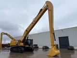 2020 Caterpillar 390F crawler excavator, side view with long-reach boom
