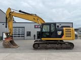 2016 Caterpillar 320E crawler excavator, side view