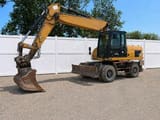 2014 Caterpillar M318D wheel excavator, side profile view