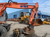 2003 Kobelco EX135W wheel excavator side view