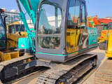 2018 Kobelco SK140LC-8 crawler excavator, front three-quarter view