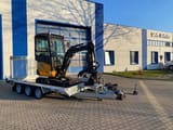 Berger Kraus BK2000NKSR mini excavator on a trailer, side view
