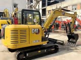 2020 Caterpillar 305.5E2 mini excavator, rear three-quarter view