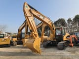 2023 Caterpillar 320CL Raupenbagger, Frontansicht von drei Viertel