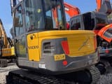 2022 Volvo EC60C mini excavator, rear three-quarter view
