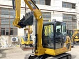 2018 Caterpillar 306D mini excavator, front three-quarter view