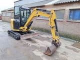 2022 Caterpillar 302.7 mini excavator, side view