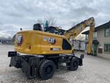 2024 Caterpillar MH3024-07D material handler, rear three-quarter view
