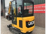 2023 JCB 19C-1 mini excavator rear three-quarter view