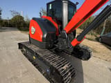2023 Yanmar VIO80 mini excavator, rear three-quarter view