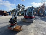 2022 Takeuchi TB257FR crawler excavator, front three-quarter view