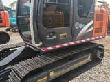 Hitachi ZX70 crawler excavator, side view of cab and tracks