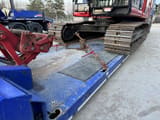 2012 Caterpillar 320E crawler excavator on trailer