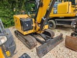 2021 Caterpillar 306CR mini excavator, front-quarter view