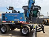 2019 Fuchs MHL 310 wheel excavator side view