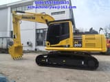 2024 Komatsu PC200 crawler excavator, side profile view