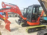 2023 Kubota U27 mini excavator, side view
