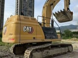 2021 Caterpillar 349 crawler excavator, rear three-quarter view