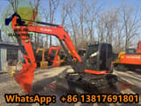 2023 Kubota KX080-4 mini excavator, side view