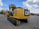 2014 Caterpillar 320E crawler excavator, rear three-quarter view