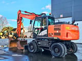 2015 Hitachi Zaxis 140W wheel excavator, rear three-quarter view