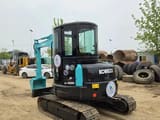 2022 Kobelco SK55SR mini excavator, rear three-quarter view