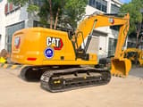2023 Caterpillar 320GC crawler excavator, rear three-quarter view