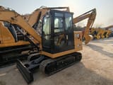 2026 Caterpillar 305.5E2 mini excavator, side view