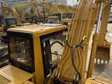 2004 Caterpillar 320BL crawler excavator, high-angle view of cab and boom