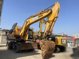 2024 Hyundai R210W-9 wheel excavator, front three-quarter view