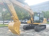 2025 Caterpillar 320GX crawler excavator, side view