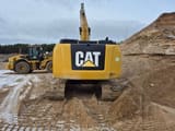 2016 Caterpillar 323FL crawler excavator, rear view