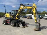 2023 Wacker Neuson EW100 wheel excavator, side view