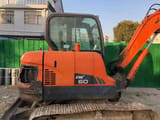 2024 Doosan DX60 mini excavator side view