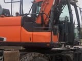 2019 Doosan DX140W-5 wheel excavator side view