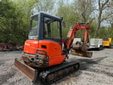2014 Kubota KX101-3 mini excavator, front three-quarter view